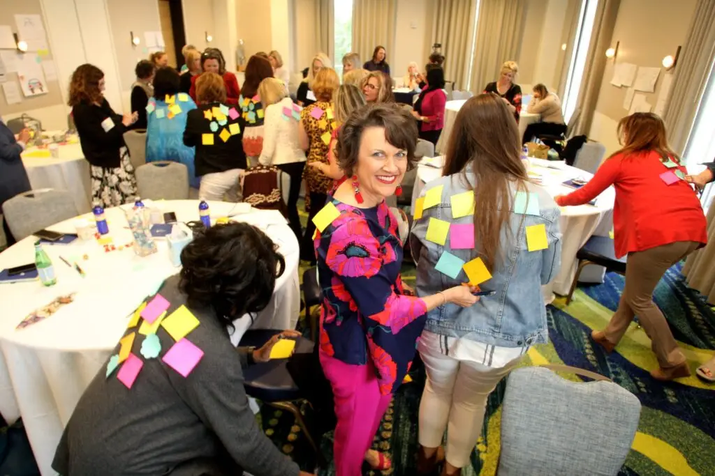 Marcella Scherer leading an interactive women’s leadership workshop exercise